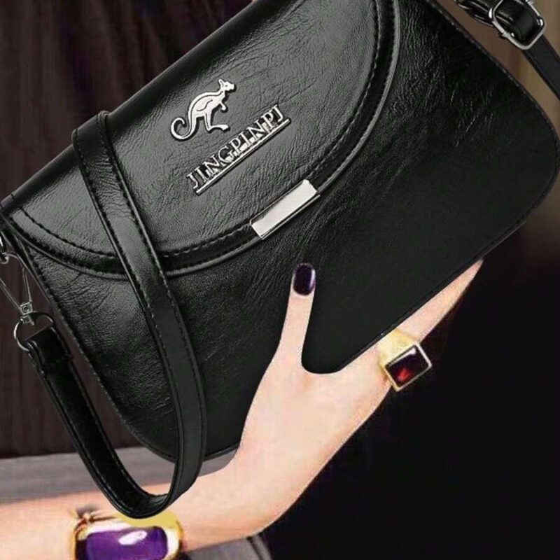 حقيبة كتف جسم واحد متعددة الاستخدامات من الجلد الاصطناعي ذات لون أحادي مع حزام كتف قابل للتعديل