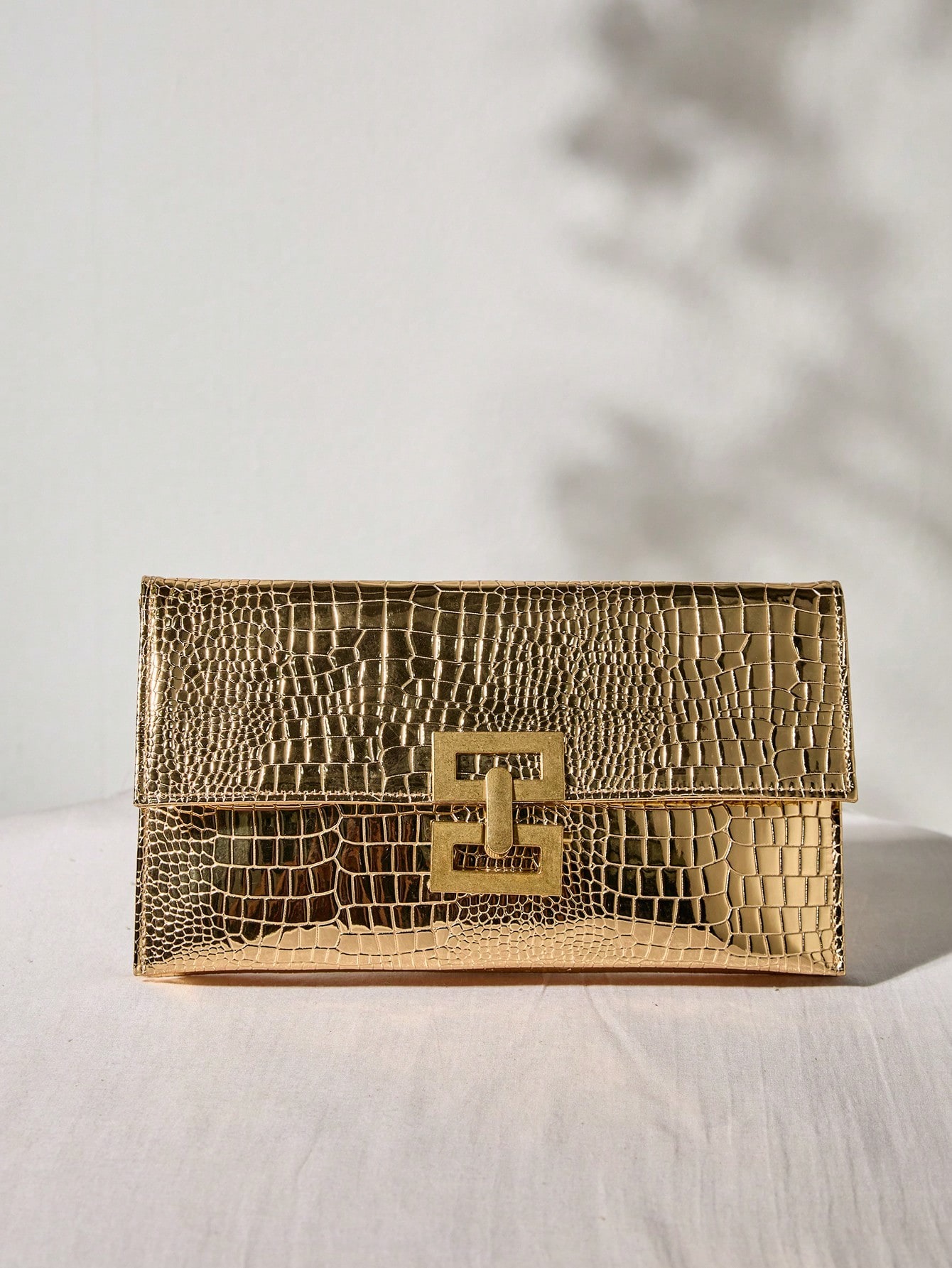 حقيبة يد فاخرة ذات لون أحادي وطراز حجري أنيق، حقيبة كلاتش عصرية للنساء هدايا عيد الميلاد والشتاء - الصورة 2